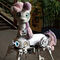 Sweetie Bot was there again. I heard they even had a panel there. Still have to look that up. I don't know if there are recordings from the smaller rooms. Sweetie Bot has changed since the last time I saw her. She did seem to be more reliable in the movements that she does. Or her controlling human had more experience. She can turn her head 360, show several emotions on her mouth display, wiggle, shake, nod her head, open up her back. The pistol with soap bubbles wasn't with her. But there's apparently plans for an improved version of it in the future.