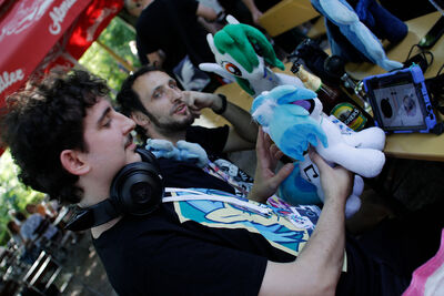 Bronies at the beergarden close by. At a certain time of the night at least one table will have loud electronic pony music playing.