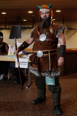 One of the few elaborate theme-related costumes this year. (Few is more than there usually are.) I think this may be my favourite viking cosplayer at this year's GalaCon. The costume fits him. And he was super-nice.