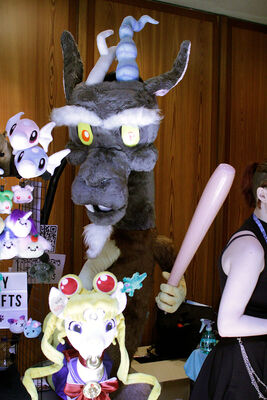 The largest plush I've ever seen was this one of Discord. He has a blow-up baseball bat, which proved to be perfect to hit passing bronies without hurting them.